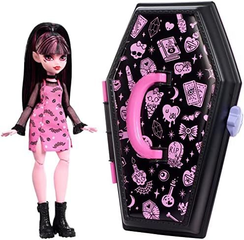 Draculaura doll with Gore-ganizer coffin beauty kit and bat clips